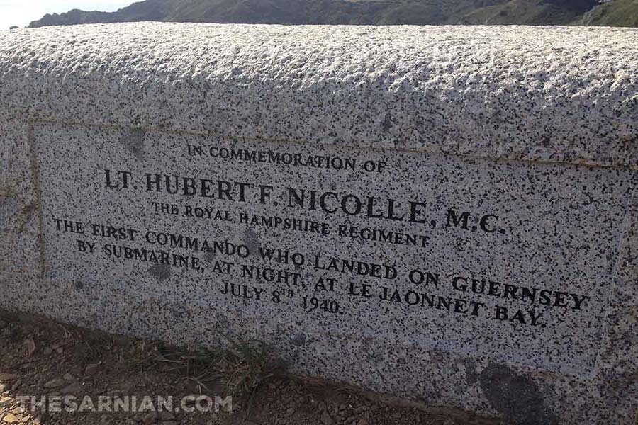 Carved granite block at Icart Point